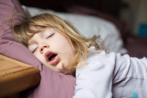 Child with sleep apnea