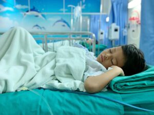 An Asian boy who is ill with Adenoid disease